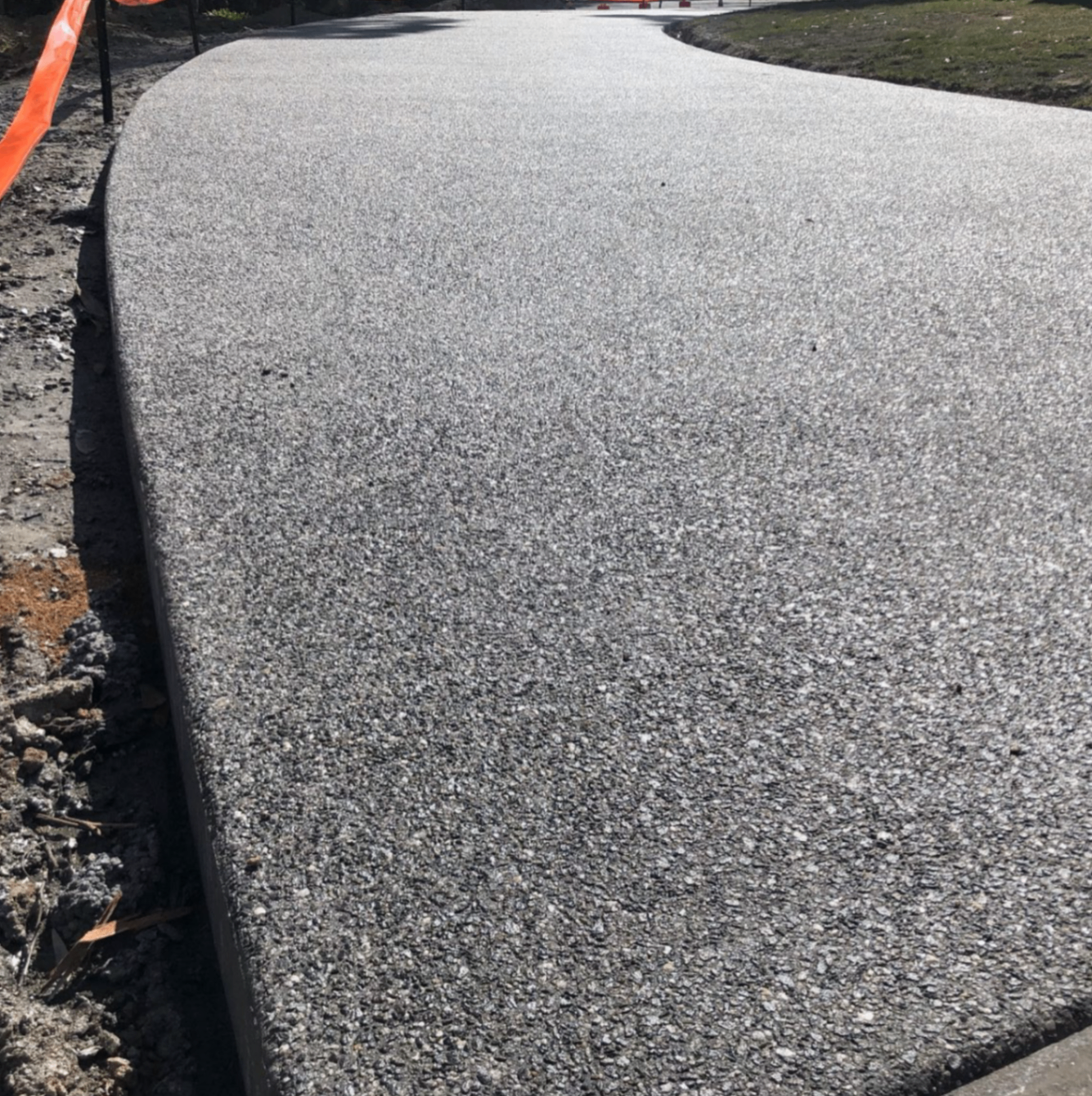 Exposed aggregate driveway close-up showing texture, Ballarat Concreting and Earthworks