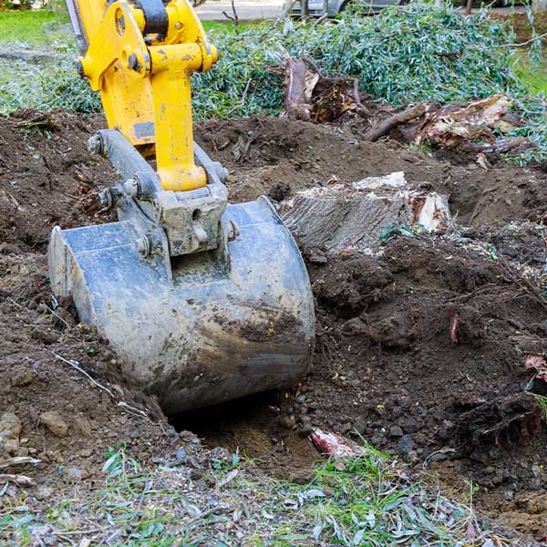 Excavator bucket clearing site ground, Ballarat Concreting and Earthworks
